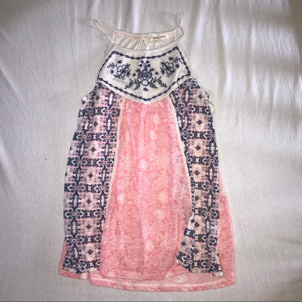 coral, navy blue, and cream tank top